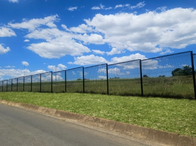 Clear View fencing and welded mesh security barrier installed along a roadway, providing reliable perimeter protection for commercial and industrial sites.